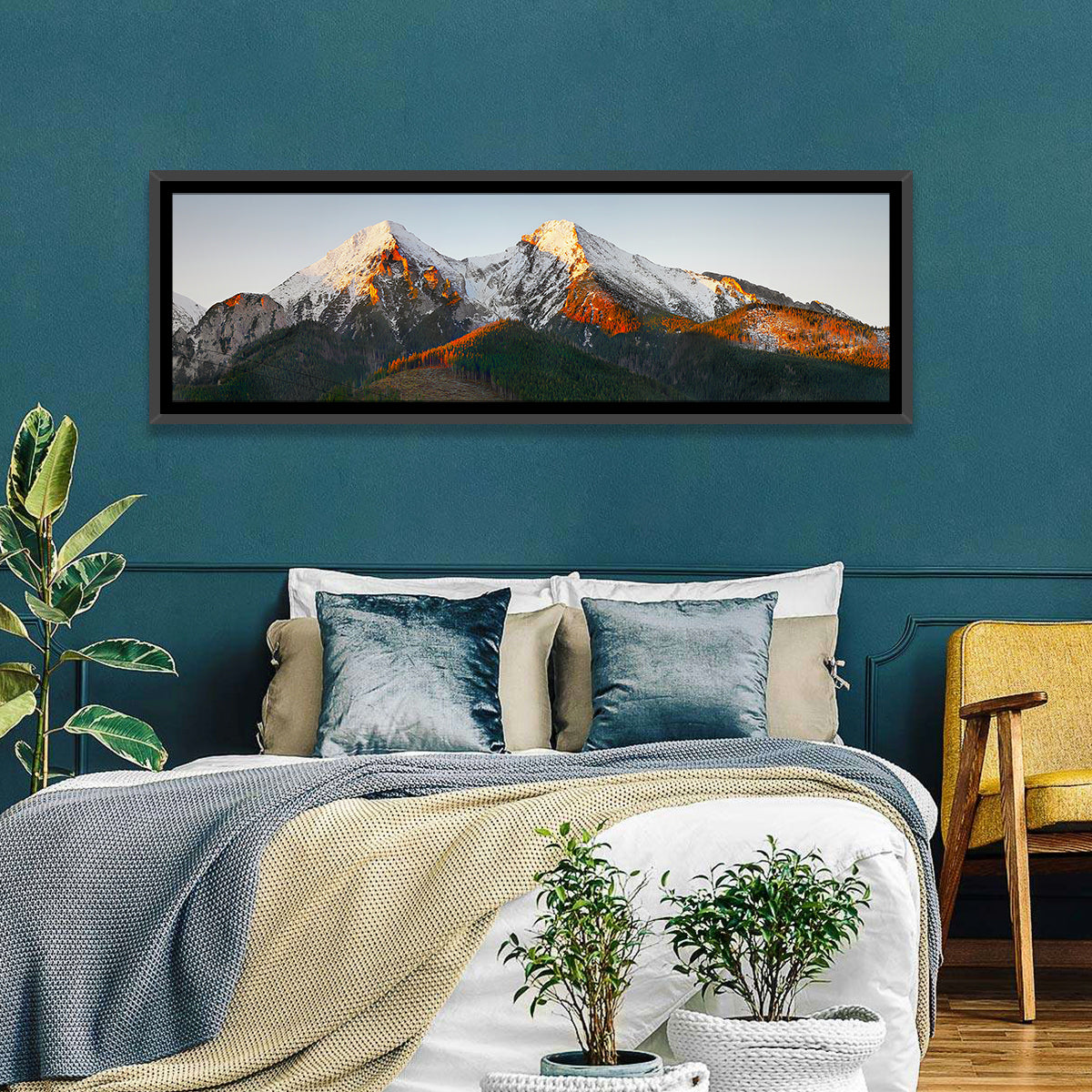 Sunlit Snow Capped Peaks Wall Art in a room, panoramic