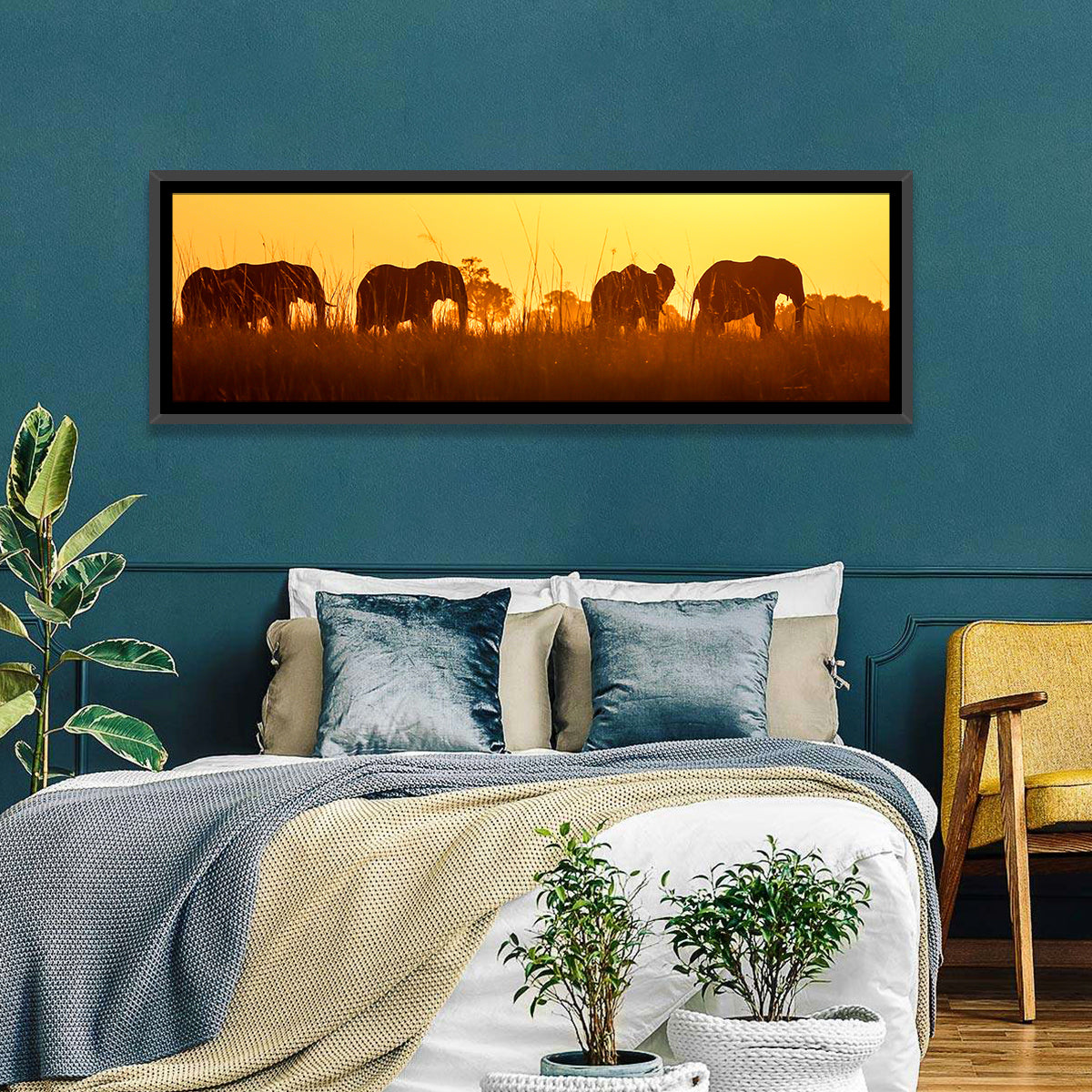 Golden Sunset Elephant Herd Wall Art in a room, panoramic