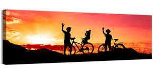 Cycling At Sunset Wall Art