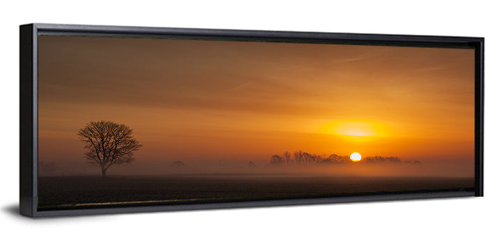 Sunrise Over Foggy Farmland Wall Art as a framed canvas