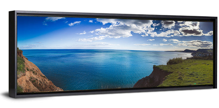 Sidmouth Cliffs and Sea View Wall Art as a framed canvas