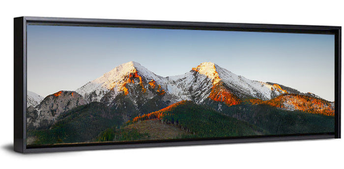 Sunlit Snow Capped Peaks Wall Art as a framed canvas