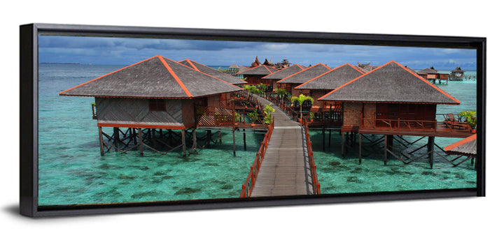 Overwater Bungalows Boardwalk Over Turquoise Sea Wall Art as a framed canvas