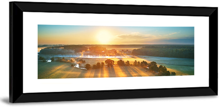 Sunrise Over Misty Meadow Wall Art as a framed print