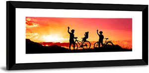 Cycling At Sunset Wall Art