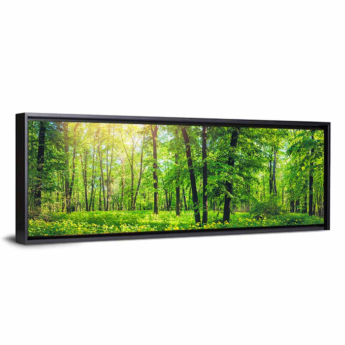 Sunlit Green Forest with Yellow Wildflowers Wall Art as a framed canvas