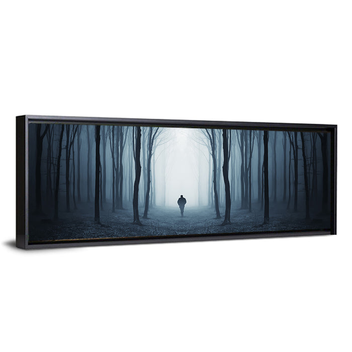 Lone Figure in Misty Forest Wall Art as a framed canvas
