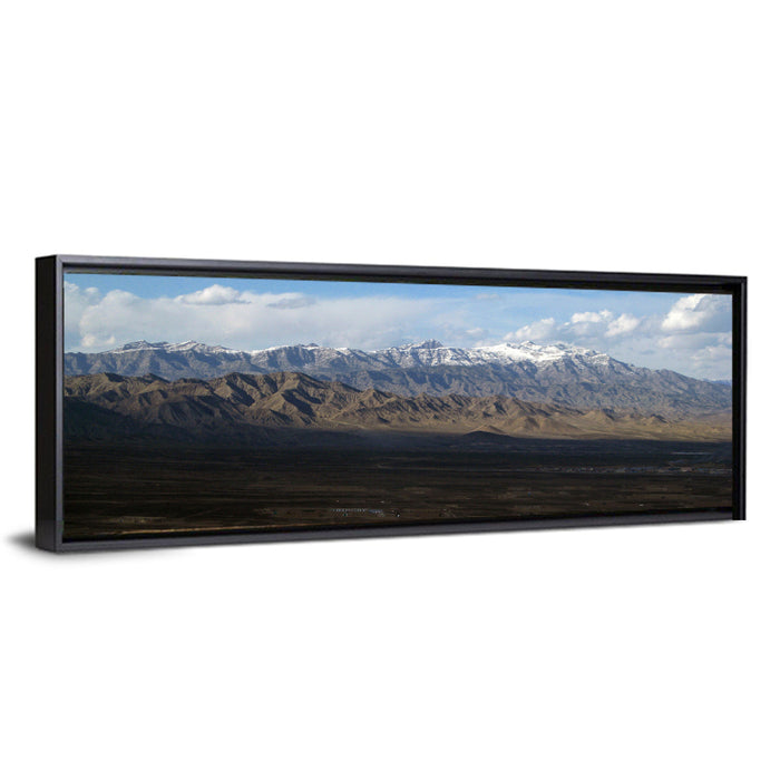 Snow-capped Afghan Mountains Wall Art as a framed canvas