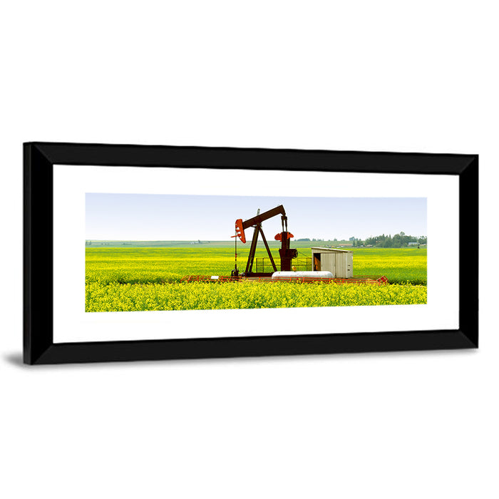 Rusty Pumpjack in Yellow Canola Field Wall Art as a framed print