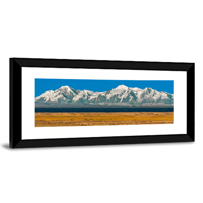 Snow-capped Peaks Over Lake Titicaca Wall Art as a framed print