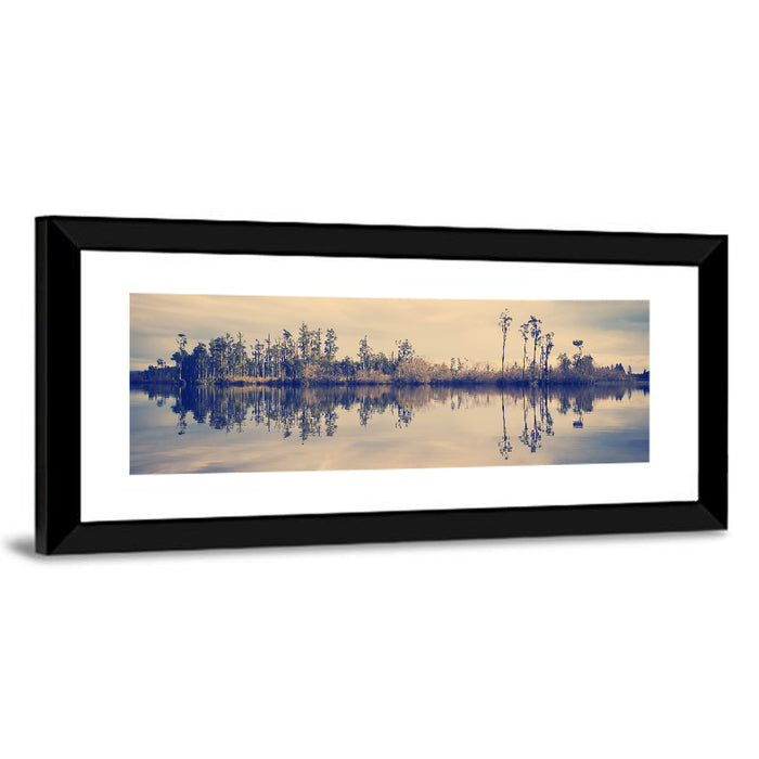 Sunset Over Forest Lake Wall Art as a framed print