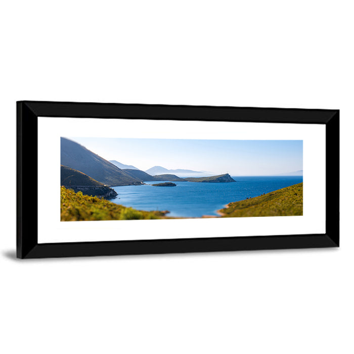 Coastal Cliffs and Lighthouse Bay Wall Art as a framed print