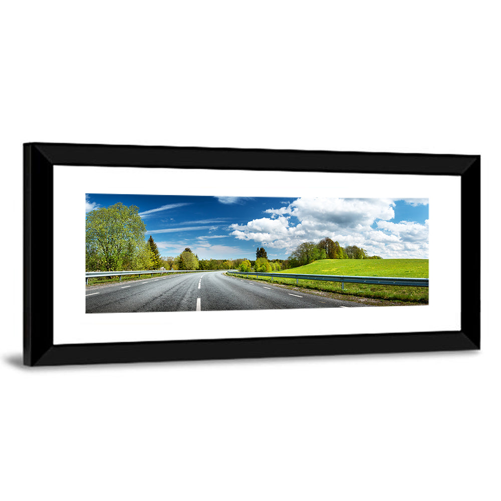 Sunlit Asphalt Road Wall Art