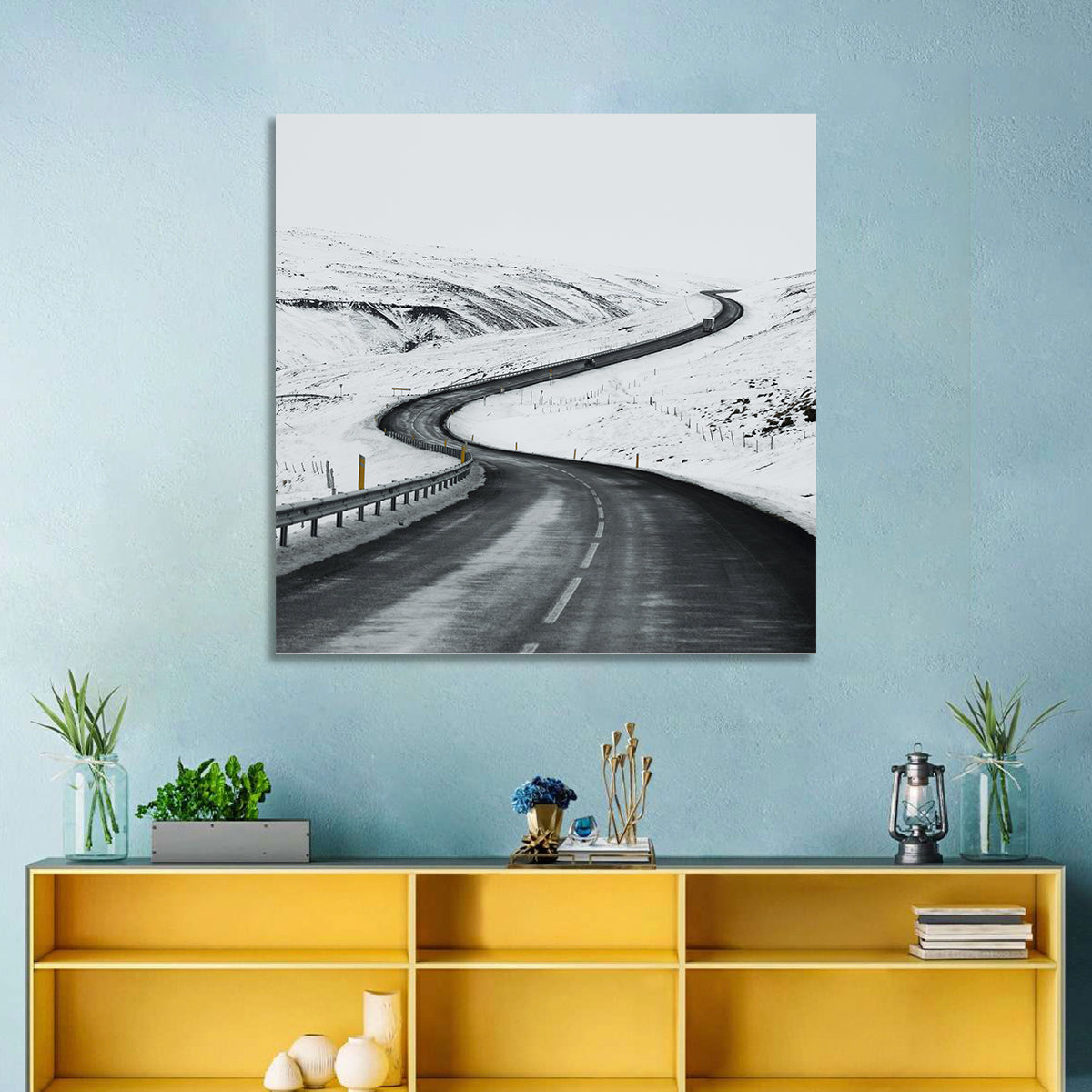 Winding Snow Road with Yellow Markers Wall Art in a room, square