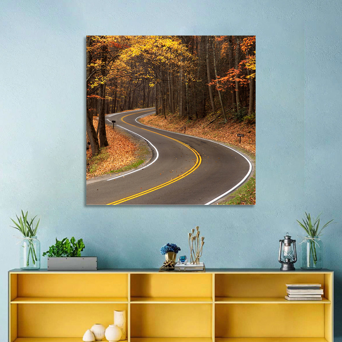 S-curve Road Through Autumn Forest Wall Art in a room, square