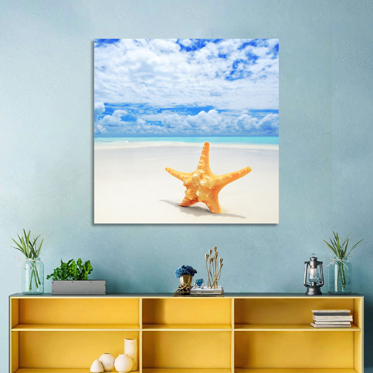 Minimalist Yellow Starfish on Turquoise Shore Wall Art in a room, square