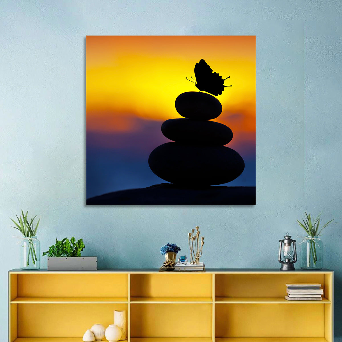 Stacked Spa Stones with Butterfly Wall Art in a room, square
