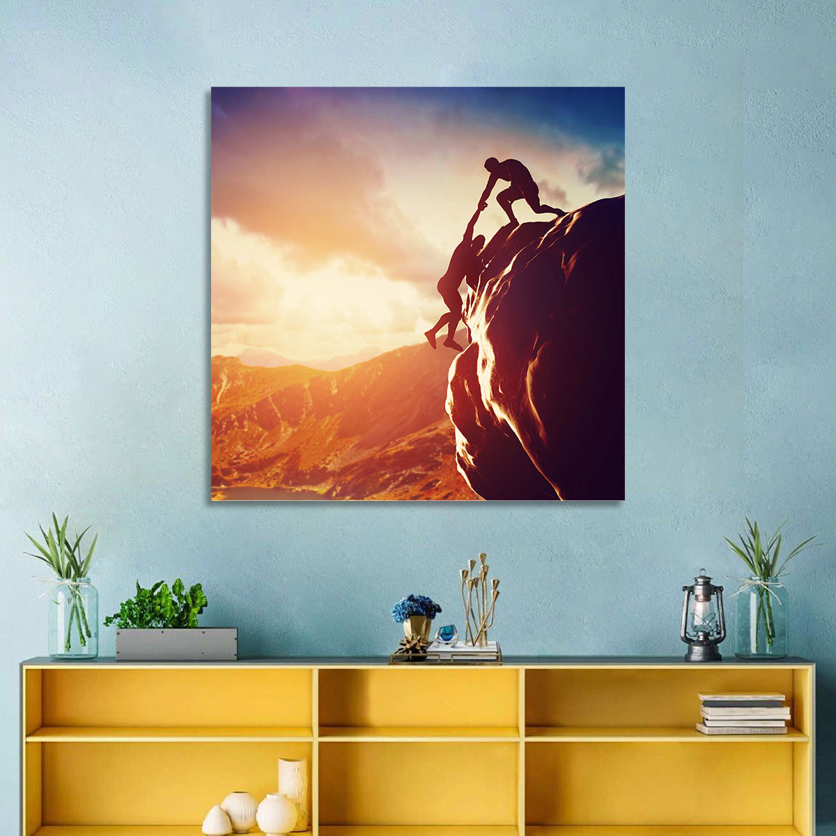 Two Hikers Summit Assist at Sunset Wall Art in a room, square