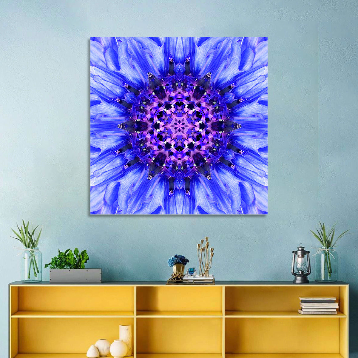Kaleidoscopic Cornflower Mandala Wall Art in a room, square