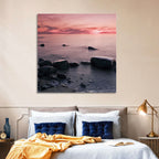 Pink Dusk Lakeshore with Silhouetted Rocks Wall Art