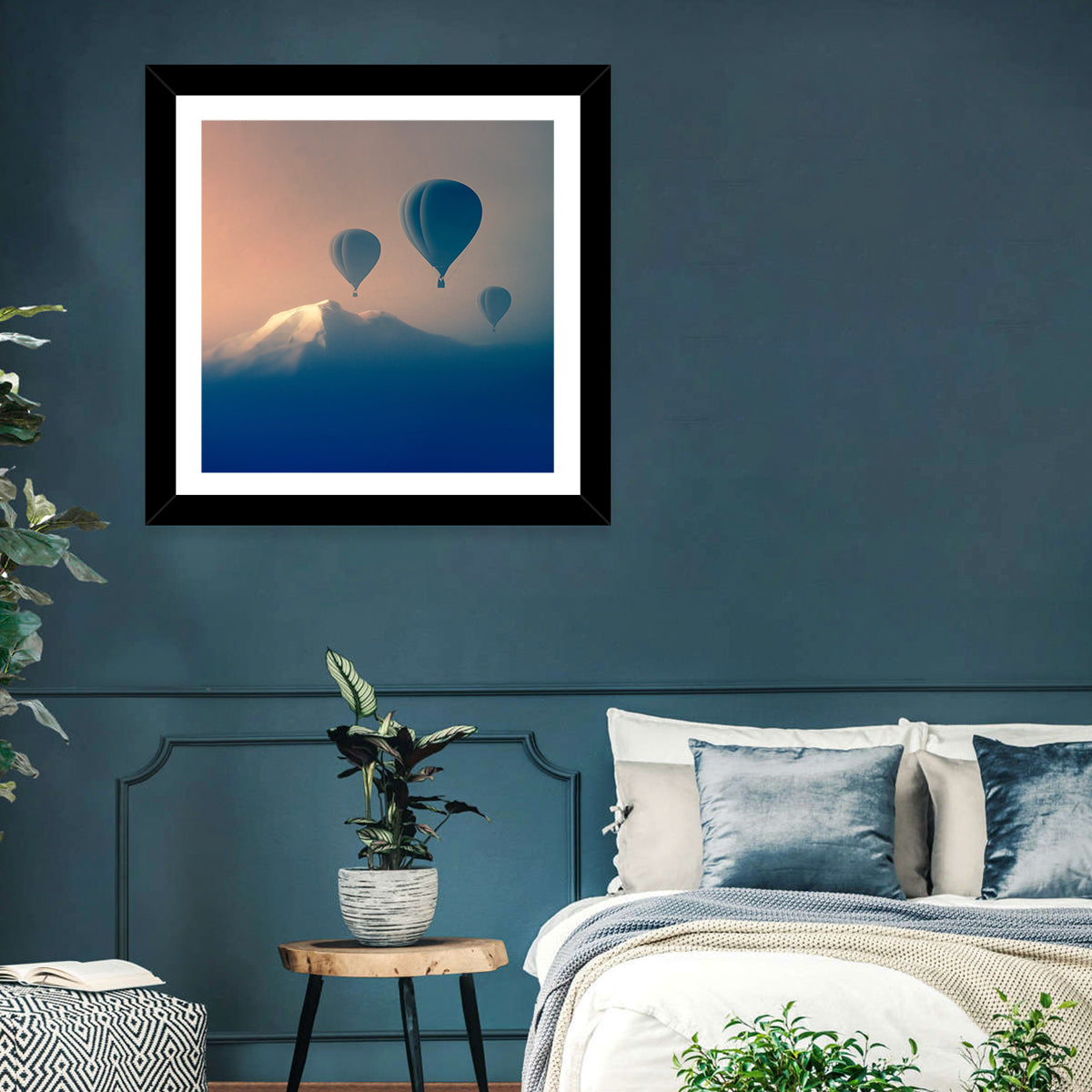 Three Hot Air Balloons Over Misty Peak Wall Art in a room, square