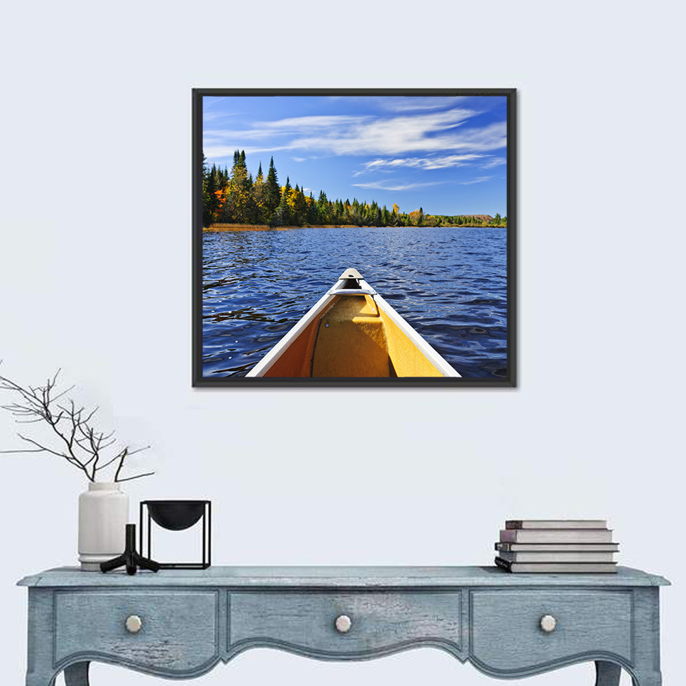 Yellow Canoe Bow on Blue Lake Wall Art in a room, square