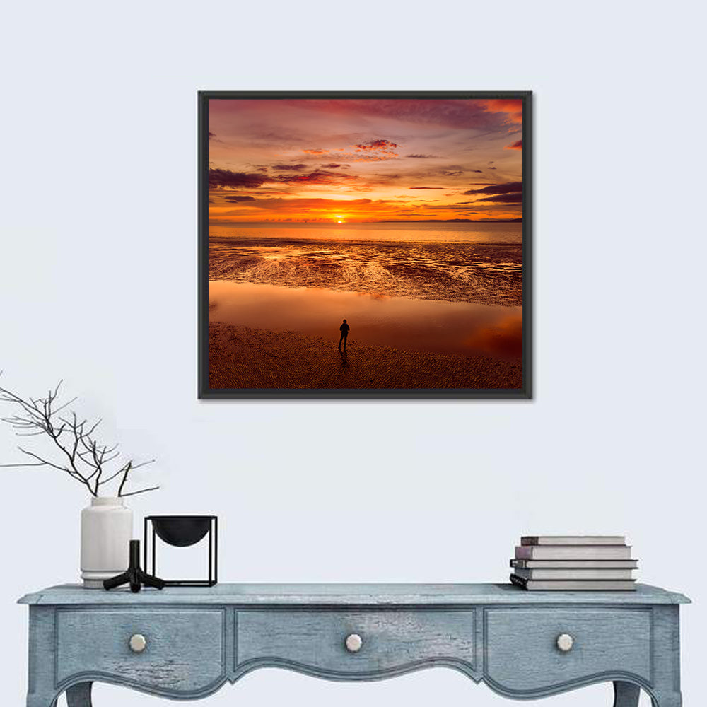 Solitary Figure on Sunset Shore Wall Art in a room, square