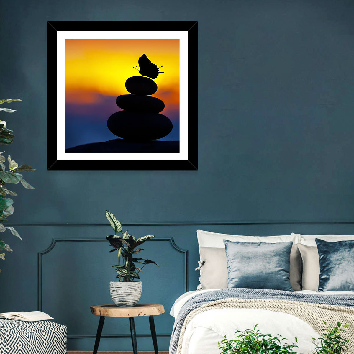 Stacked Spa Stones with Butterfly Wall Art in a room, square