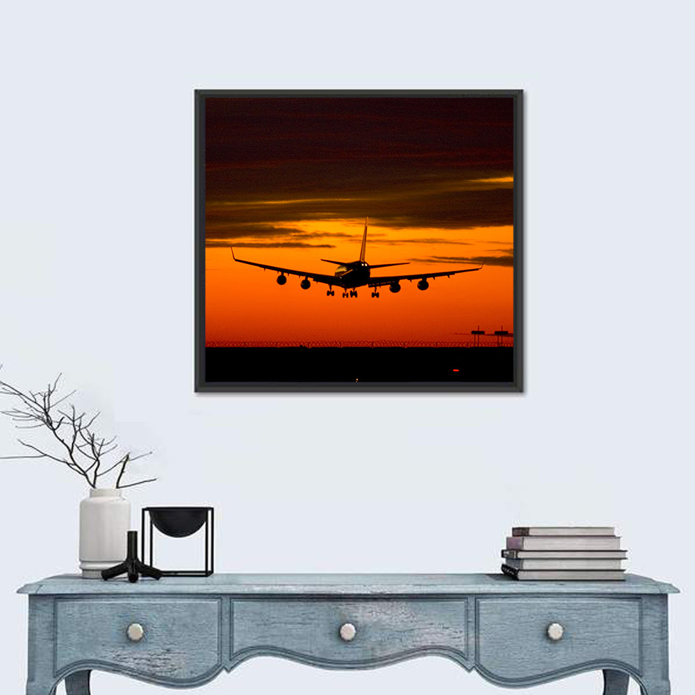 Plane Landing at Sunset Wall Art