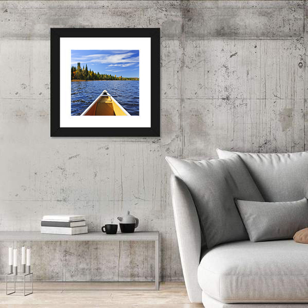 Yellow Canoe Bow on Blue Lake Wall Art in a room, square