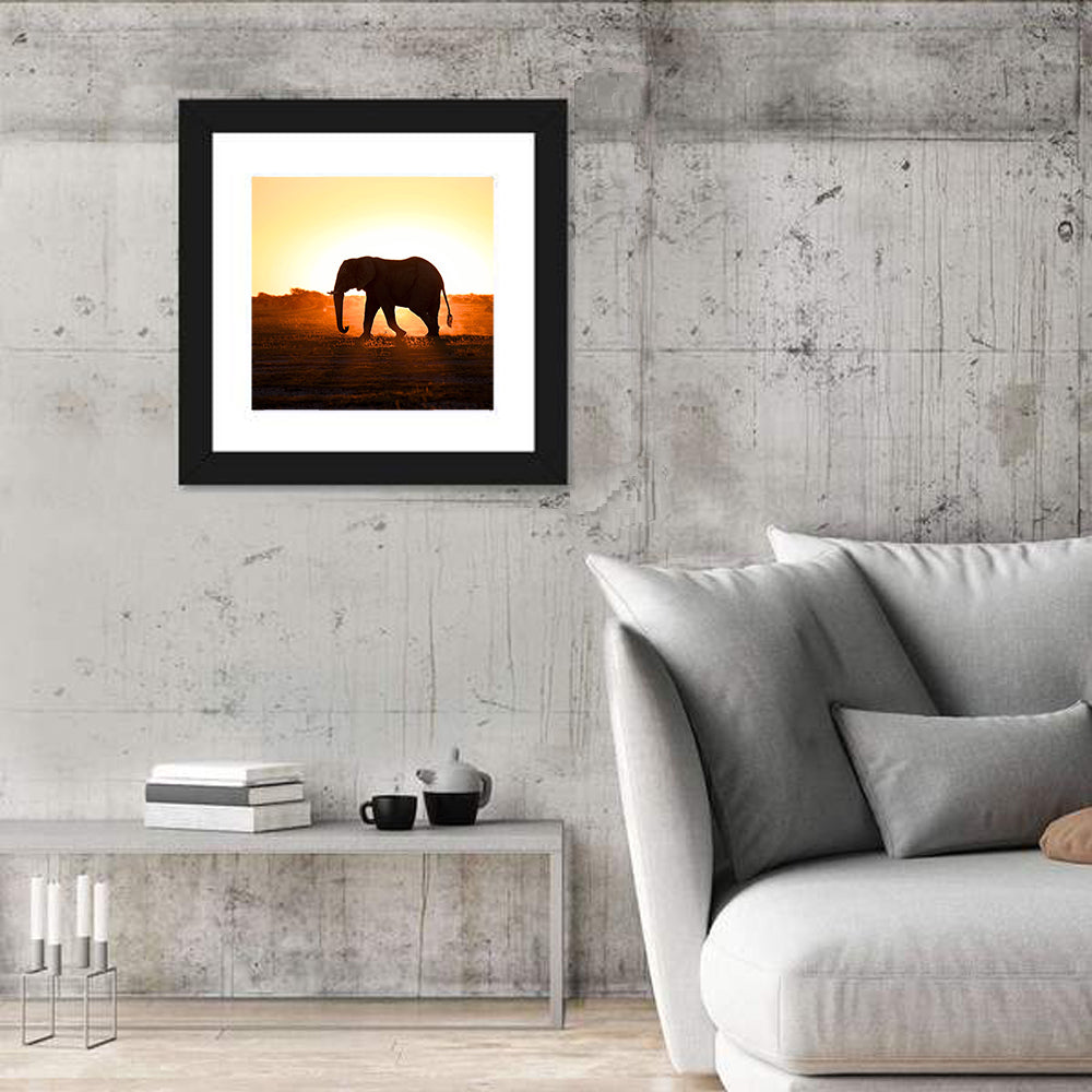 Golden Hour Elephant Silhouette Wall Art in a room, square
