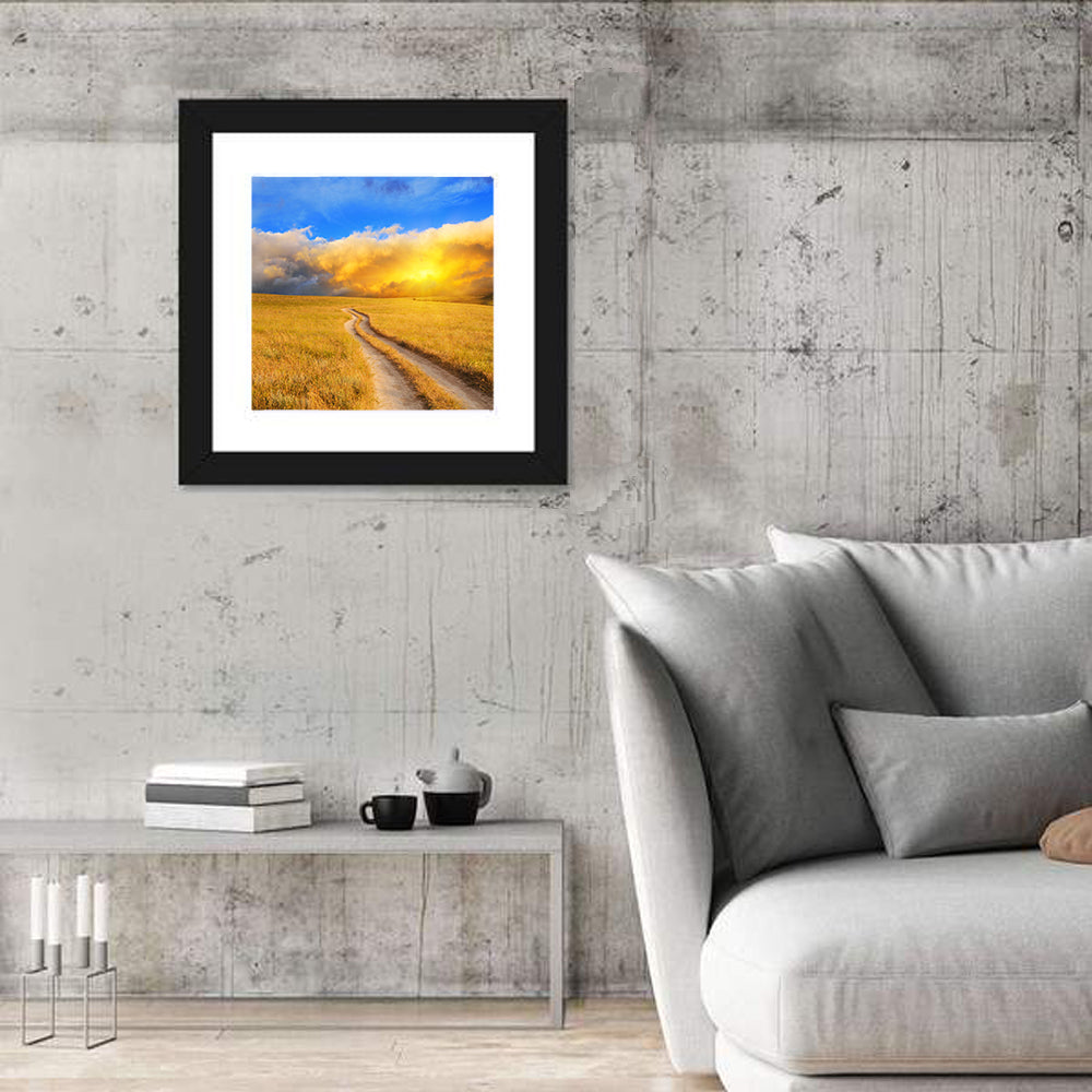 Sunlit Meadow Path with Dramatic Clouds Wall Art in a room, square