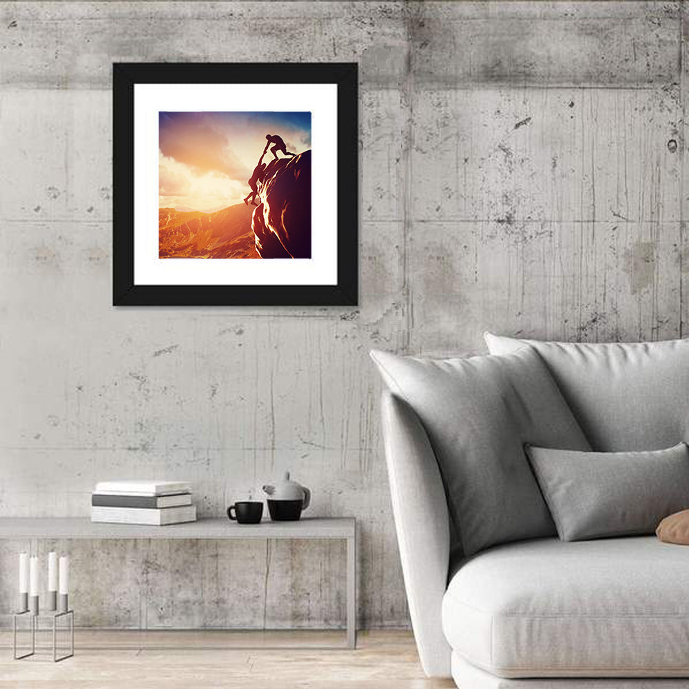 Two Hikers Summit Assist at Sunset Wall Art in a room, square