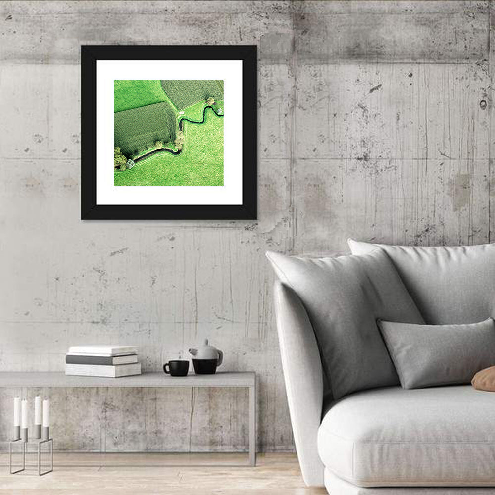 Meandering Stream Over Farmland Wall Art in a room, square