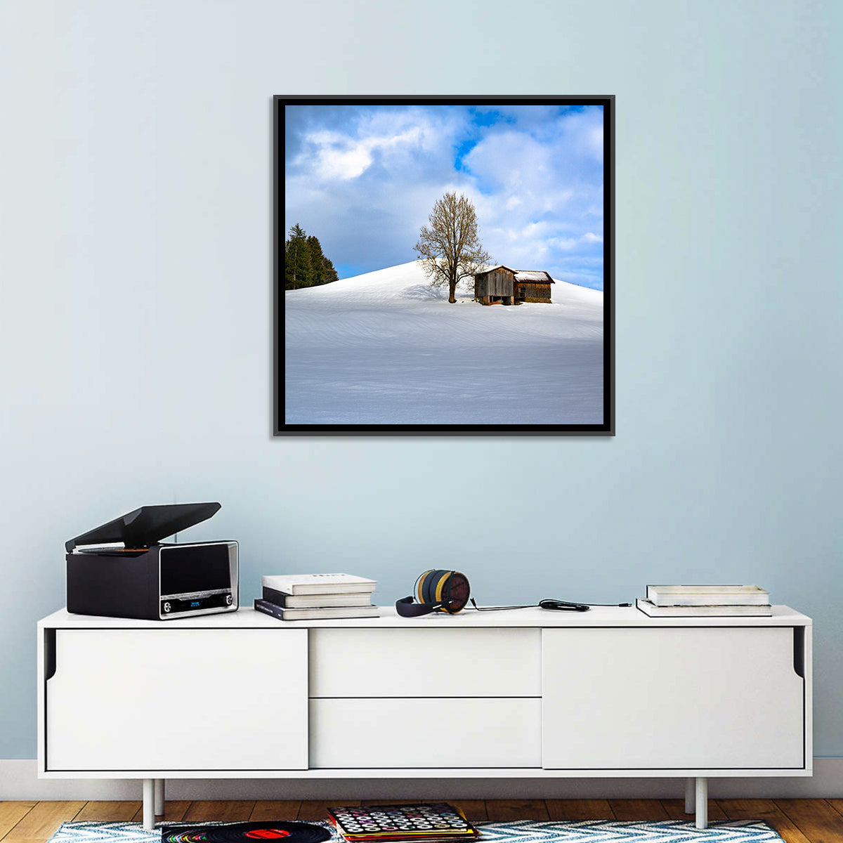 Rustic Barn on a Snowy Hill Wall Art in a room, square