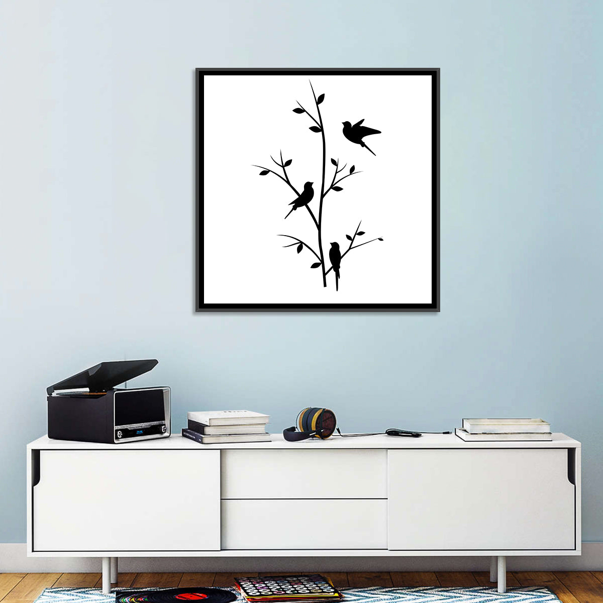 Three Birds on Branch Silhouette Wall Art in a room, square