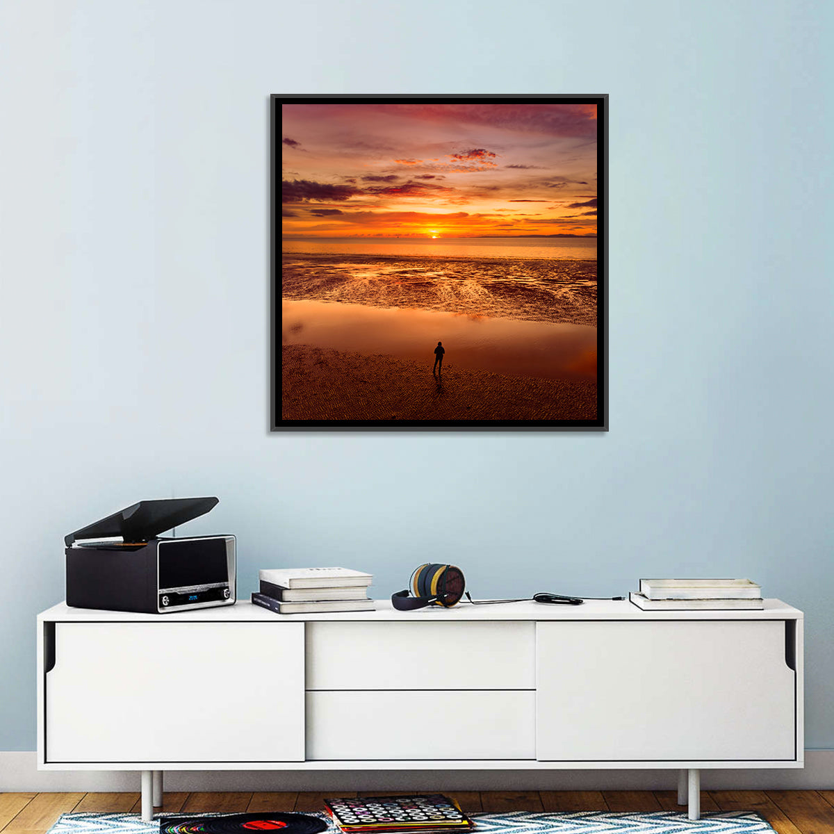 Solitary Figure on Sunset Shore Wall Art in a room, square