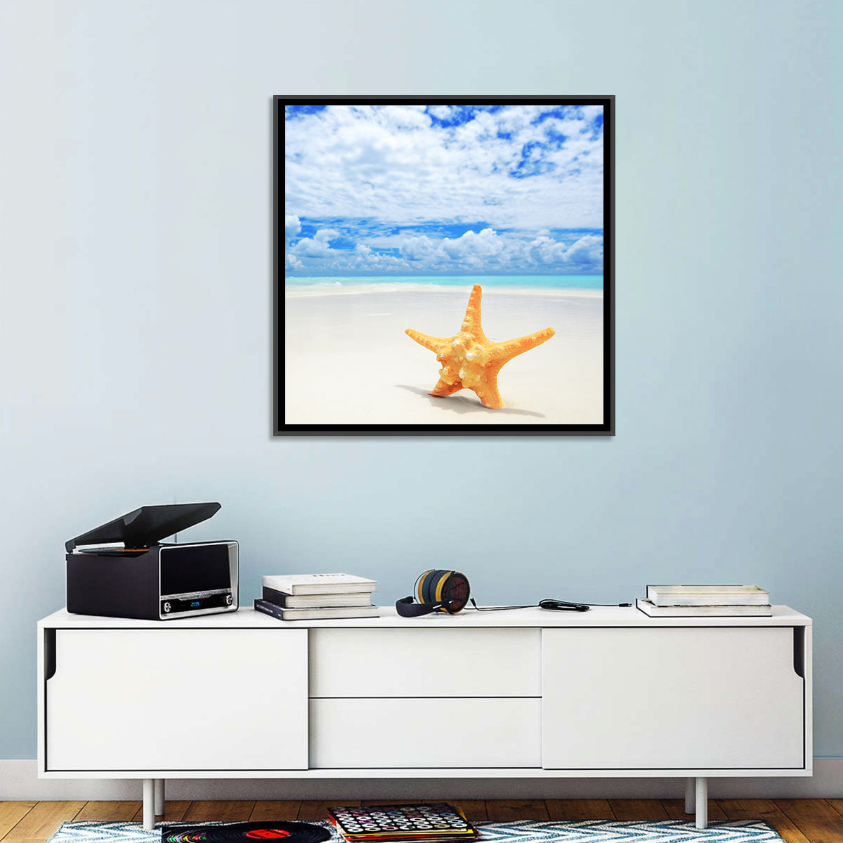 Minimalist Yellow Starfish on Turquoise Shore Wall Art in a room, square