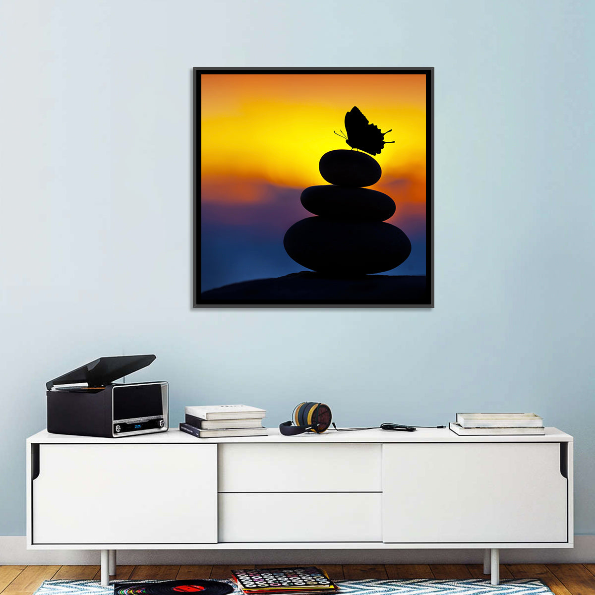 Stacked Spa Stones with Butterfly Wall Art in a room, square