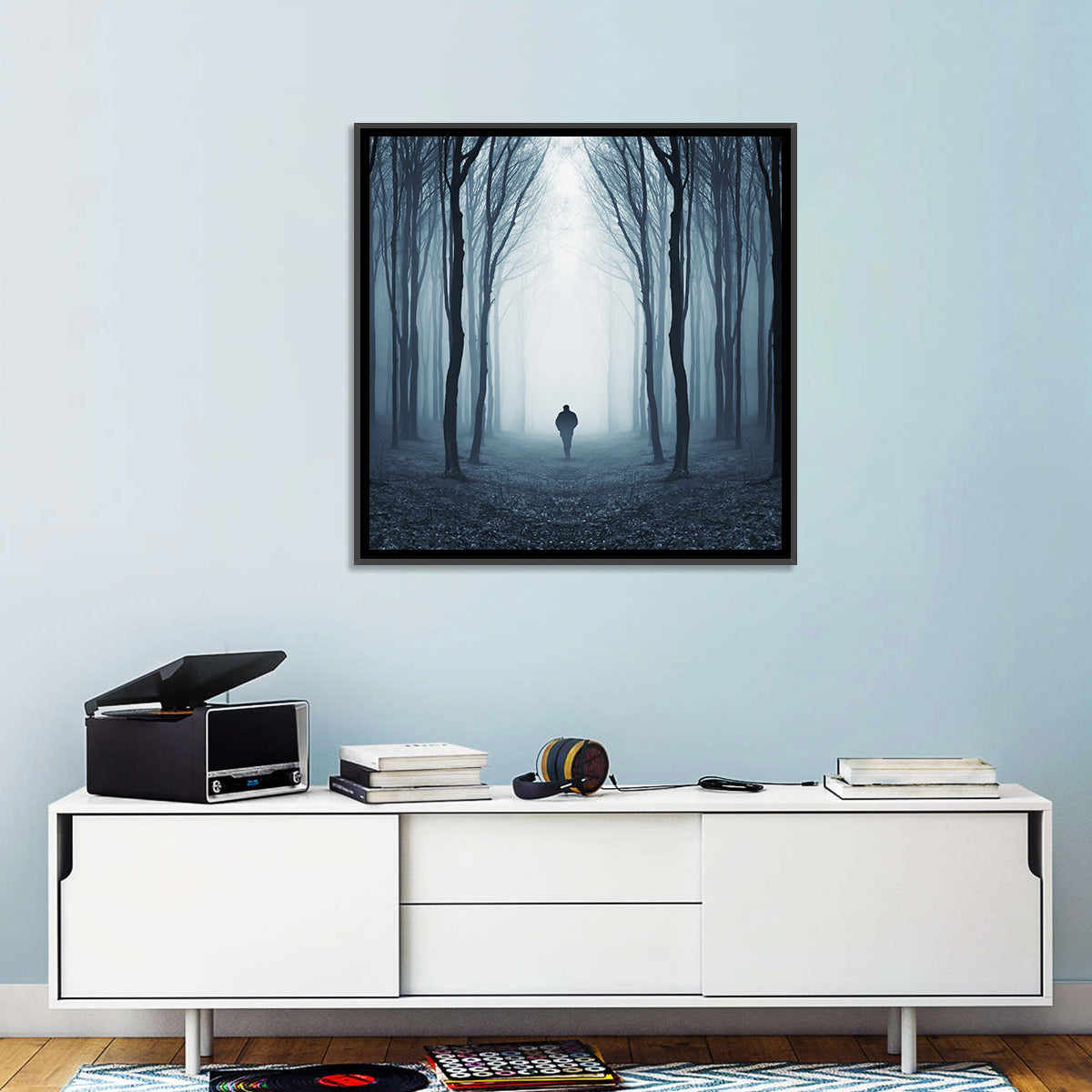 Lone Figure in Misty Forest Wall Art in a room, square