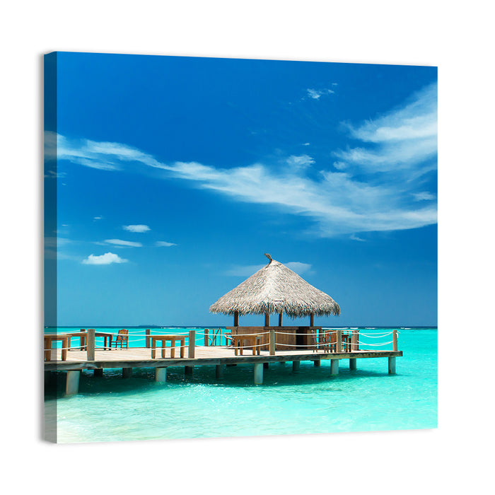 Thatched Beach Bar Pier Wall Art as a canvas print