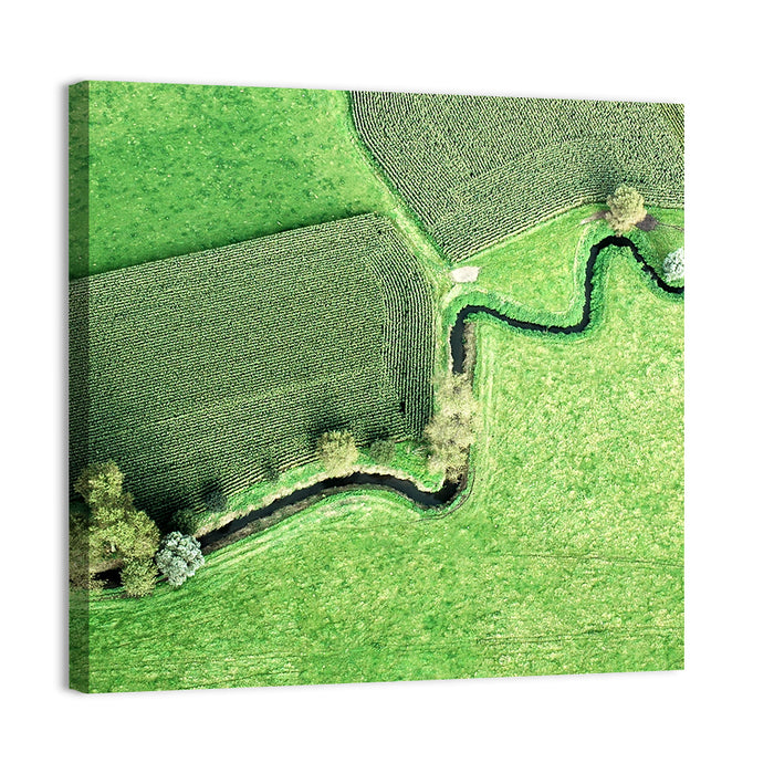 Meandering Stream Over Farmland Wall Art as a canvas print
