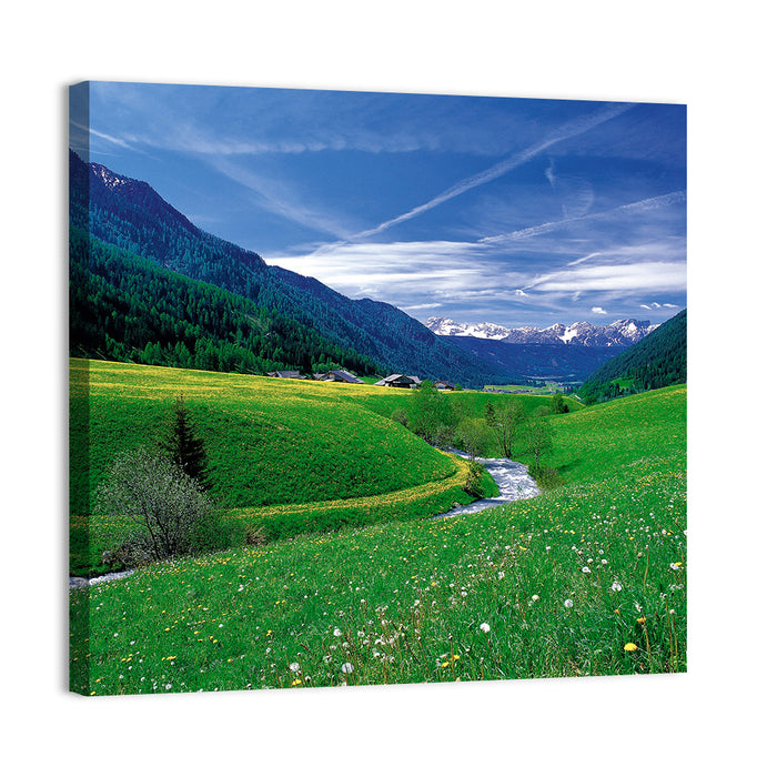 Snow-capped Peaks and Floral Meadow Wall Art as a canvas print