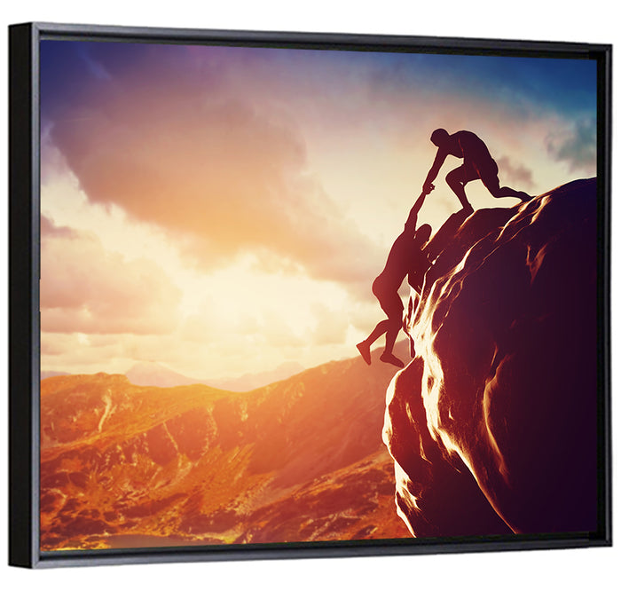 Two Hikers Summit Assist at Sunset Wall Art as a framed canvas