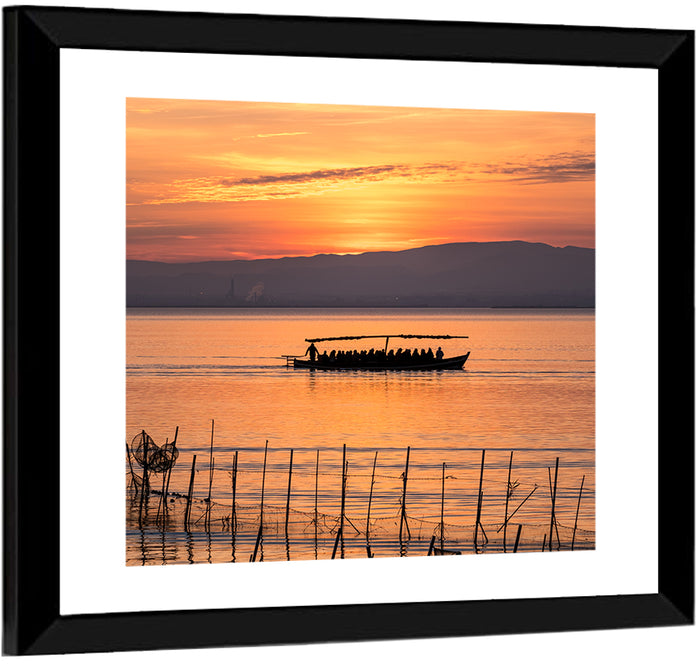 Albufera Sunrise Boat Silhouette Wall Art as a framed print
