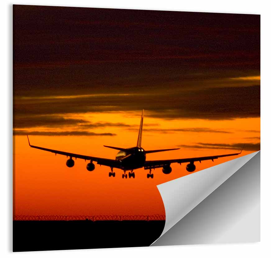 Plane Landing at Sunset Wall Art