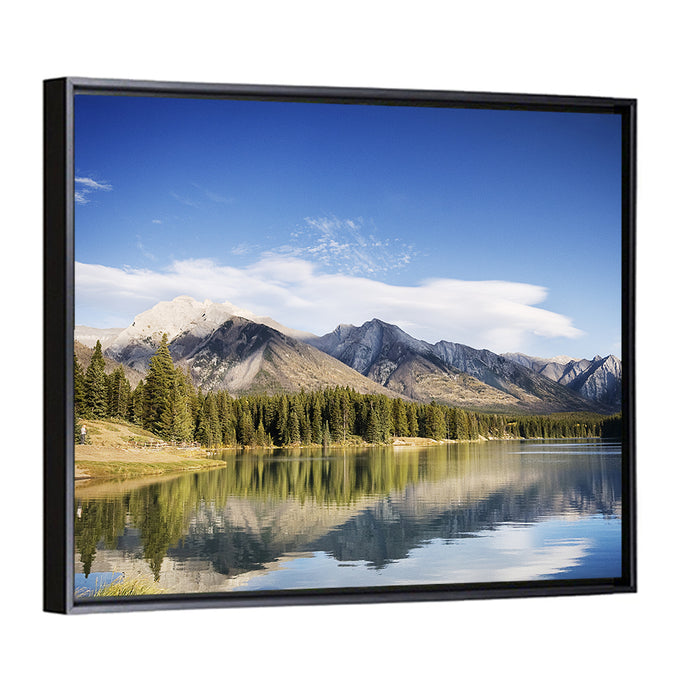 Minnewanka Lake Reflection Wall Art as a framed canvas