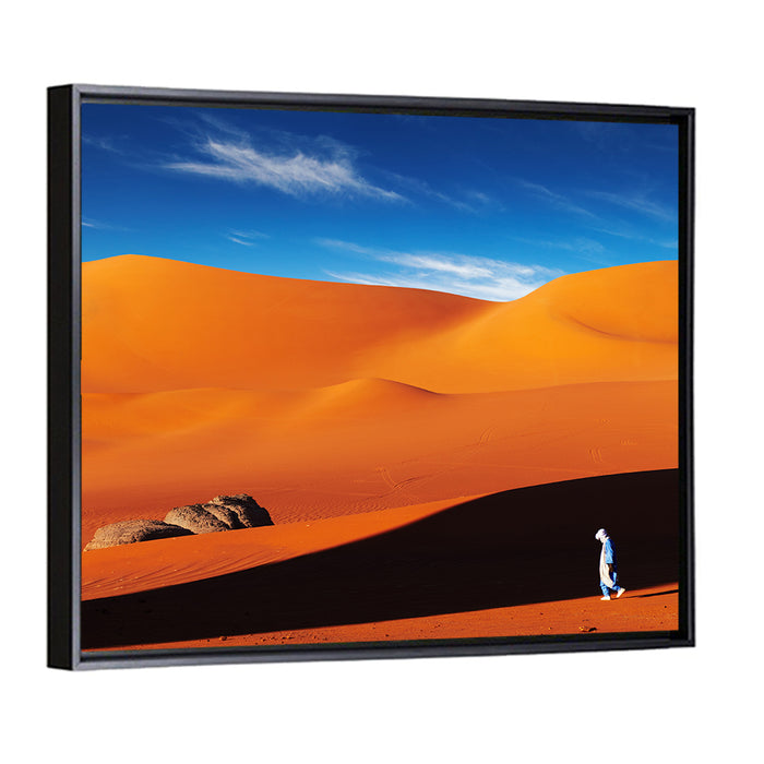 Solitary Figure on Sahara Dunes Wall Art as a framed canvas