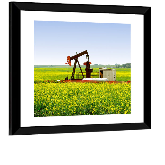 Rusty Pumpjack in Yellow Canola Field Wall Art as a framed print