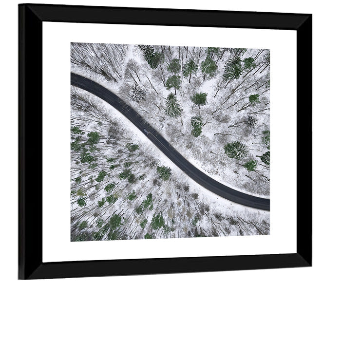 Snowy Forest Road Wall Art as a framed print